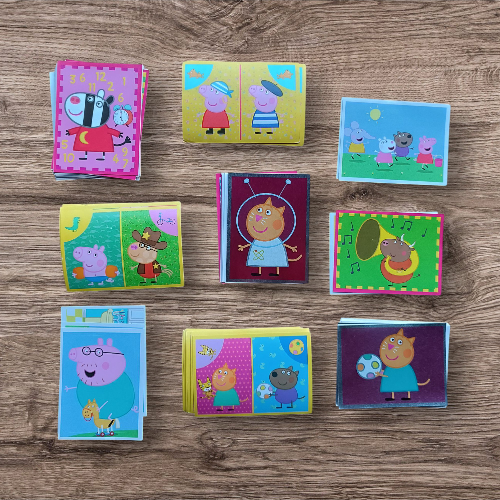 Lote 74 figuritas y cartas sin repetir Peppa Pig